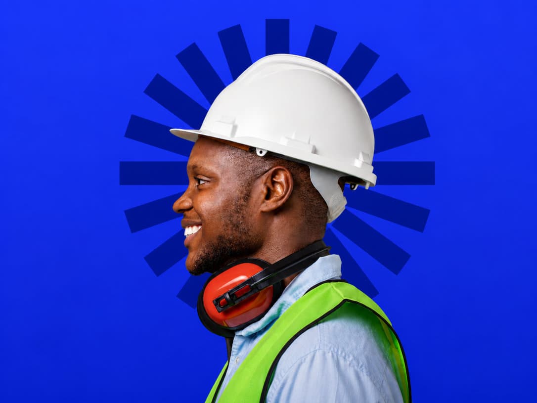 A MEKONE field technician in branded safety gear